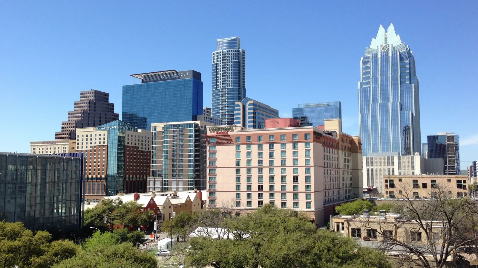 Downtown Austin buildings under a blue sky